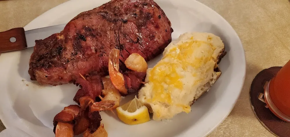 Ribeye Steak with Bacon Jalapeño Shrimp and Twice Baked Potato